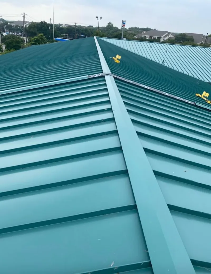Green commercial metal roof ridge and valley for Metal Roof Repair in Montclair